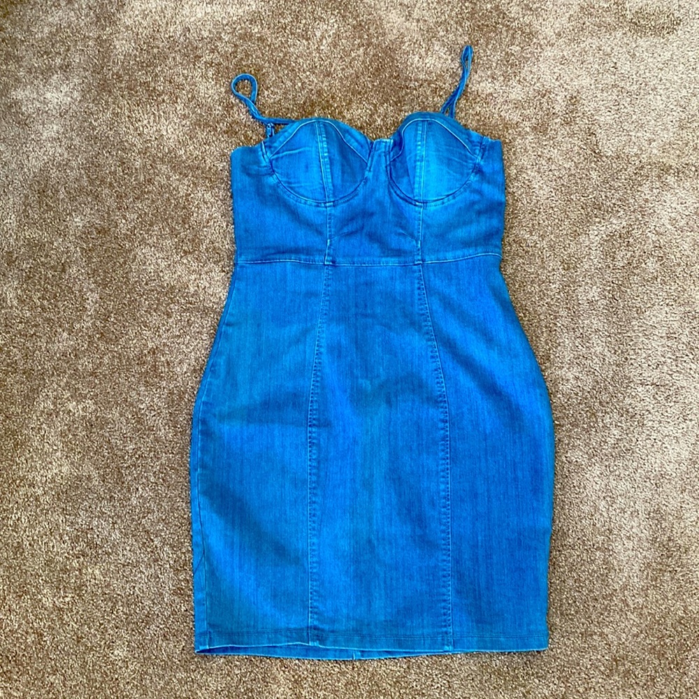 Denim mini dress. Built-in bra with adjustable straps.